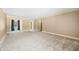 Spacious bedroom with neutral carpeting and large windows at 2940 Washington St, Columbus, IN 47201