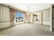 Spacious dining room with window overlooking snowy landscape at 2940 Washington St, Columbus, IN 47201