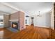 Bright dining room with hardwood floors and a view into the living room at 2940 Washington St, Columbus, IN 47201