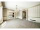 Sunlit dining room with chandelier and access to other rooms at 2940 Washington St, Columbus, IN 47201