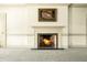 Elegant fireplace with brick hearth and ornate mantel at 2940 Washington St, Columbus, IN 47201