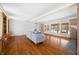 Spacious living room with hardwood floors, built-in shelving, and fireplace at 2940 Washington St, Columbus, IN 47201