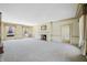 Spacious living room with fireplace and large windows at 2940 Washington St, Columbus, IN 47201