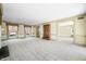 Open living room with views into adjacent dining room at 2940 Washington St, Columbus, IN 47201