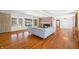 Living room features hardwood floors, a brick fireplace, and built-in shelving at 2940 Washington St, Columbus, IN 47201