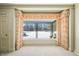 Living room with bay window and scenic winter view at 2940 Washington St, Columbus, IN 47201