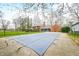 Large backyard pool with cover and brick home with black fence at 2940 Washington St, Columbus, IN 47201