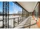 Covered porch with wrought iron railings and winter views at 2940 Washington St, Columbus, IN 47201