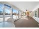 Bright screened porch with views of the backyard and seating area at 2940 Washington St, Columbus, IN 47201