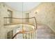 Upper view of curved staircase with chandelier and railing at 2940 Washington St, Columbus, IN 47201