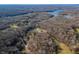 Aerial view showing house and property by lake at 3264 W Roberts Rd, Trafalgar, IN 46181