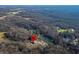Aerial view of house near lake with location marker at 3264 W Roberts Rd, Trafalgar, IN 46181