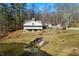 Home on wooded lot with private pond and dock at 3264 W Roberts Rd, Trafalgar, IN 46181