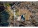 Aerial view showing house, pond and large yard at 3264 W Roberts Rd, Trafalgar, IN 46181