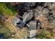 Aerial view of house and expansive property with pond at 3264 W Roberts Rd, Trafalgar, IN 46181