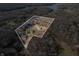 Aerial view showing property lines of house near lake at 3264 W Roberts Rd, Trafalgar, IN 46181