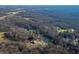 Aerial view of house and property by the lake at 3264 W Roberts Rd, Trafalgar, IN 46181