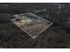Aerial view showing property boundaries of house near lake at 3264 W Roberts Rd, Trafalgar, IN 46181