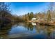 Stunning home nestled on a wooded lot with a pond at 3264 W Roberts Rd, Trafalgar, IN 46181