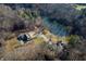 Aerial view of two houses and expansive property with pond at 3264 W Roberts Rd, Trafalgar, IN 46181