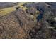 Aerial view of property near a lake and wooded area at 3264 W Roberts Rd, Trafalgar, IN 46181