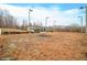 Large backyard with fire pit and tall light posts at 3264 W Roberts Rd, Trafalgar, IN 46181