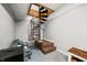 Basement with spiral staircase and sitting area at 3264 W Roberts Rd, Trafalgar, IN 46181