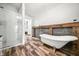 Elegant bathroom featuring a clawfoot tub, subway tile shower, and wood-look floors at 3264 W Roberts Rd, Trafalgar, IN 46181