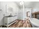 Modern bathroom with white subway tile and freestanding tub at 3264 W Roberts Rd, Trafalgar, IN 46181