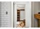 Walk-in closet with built-in shelving and bench at 3264 W Roberts Rd, Trafalgar, IN 46181