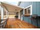 Wooden deck with seating area, offering views of the wooded area at 3264 W Roberts Rd, Trafalgar, IN 46181