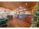 Well-stocked home bar with a vintage design, perfect for entertaining at 3264 W Roberts Rd, Trafalgar, IN 46181