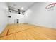 Bright indoor court featuring a basketball hoop and hardwood floor at 3264 W Roberts Rd, Trafalgar, IN 46181