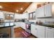 Modern kitchen with white cabinets, granite countertops and an island at 3264 W Roberts Rd, Trafalgar, IN 46181
