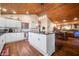 Spacious kitchen featuring white cabinets, granite countertops, and stainless steel appliances at 3264 W Roberts Rd, Trafalgar, IN 46181