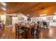 Open concept kitchen with white cabinets, granite countertops, and wood flooring at 3264 W Roberts Rd, Trafalgar, IN 46181