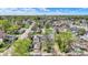 Bird's-eye view of residences, revealing varying architectural styles and the surrounding landscape of trees at 35 S Catherwood Ave, Indianapolis, IN 46219