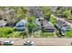 Aerial view of the neighborhood with mature trees and a mix of home styles at 35 S Catherwood Ave, Indianapolis, IN 46219