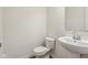Clean bathroom with pedestal sink and toilet at 3921 Wren Dr, Brownsburg, IN 46112