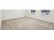 Bright bedroom with neutral carpeting and large window at 3921 Wren Dr, Brownsburg, IN 46112