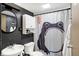 Clean bathroom with dark walls, white sink, and frog shower curtain at 3965 N Meridian St # Apt 6C, Indianapolis, IN 46208