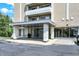 Stylish building entrance with modern canopy and landscaping at 3965 N Meridian St # Apt 6C, Indianapolis, IN 46208