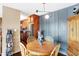 Cozy dining area with wood table and chairs, adjacent to kitchen at 3965 N Meridian St # Apt 6C, Indianapolis, IN 46208