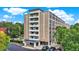 Modern multi-story building with ample parking and landscaping at 3965 N Meridian St # Apt 6C, Indianapolis, IN 46208