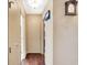 Bright hallway with hardwood floors and neutral walls at 3965 N Meridian St # Apt 6C, Indianapolis, IN 46208