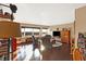 Sunlit living room with hardwood floors, comfortable seating, and large windows at 3965 N Meridian St # Apt 6C, Indianapolis, IN 46208