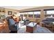 Spacious living room with hardwood floors, large windows, and comfortable seating at 3965 N Meridian St # Apt 6C, Indianapolis, IN 46208