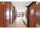 Elegant building lobby with wood paneling and mirrored walls at 3965 N Meridian St # Apt 6C, Indianapolis, IN 46208