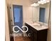 Modern bathroom with double vanity and updated lighting at 4103 Railhead Ave, Westfield, IN 46074