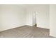 A carpeted bedroom featuring an open doorway at 4103 Railhead Ave, Westfield, IN 46074